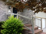 refurbished-porch-with-railing